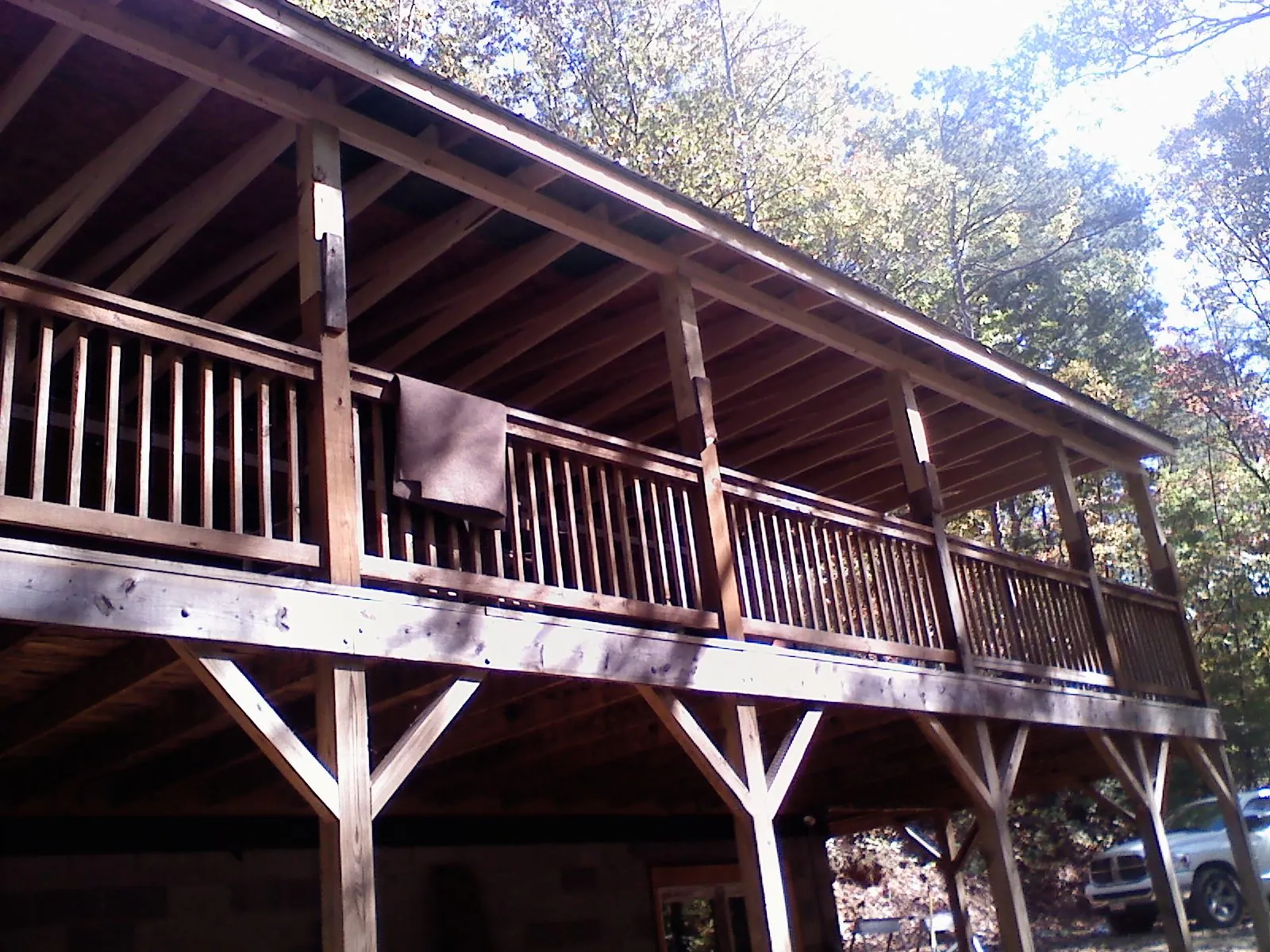 Timber framing under a new elevated porch and deck — Roof Leak Repair in Sutton by Roofing Brothers